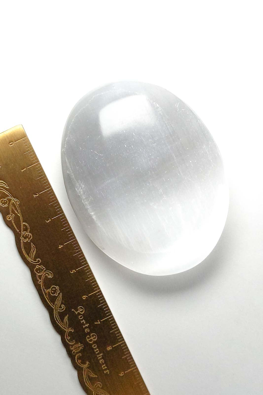Polished Selenite with a Clouded White Center 69mm 98g
