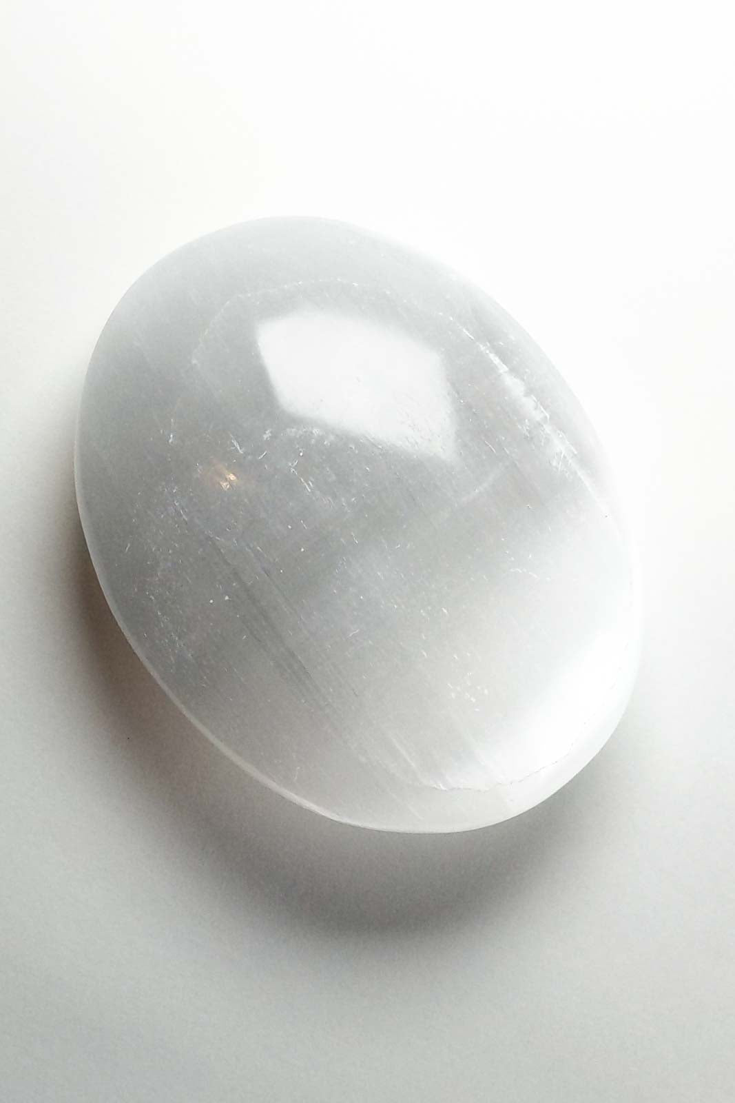 Polished Selenite with a Clouded White Center 69mm 98g