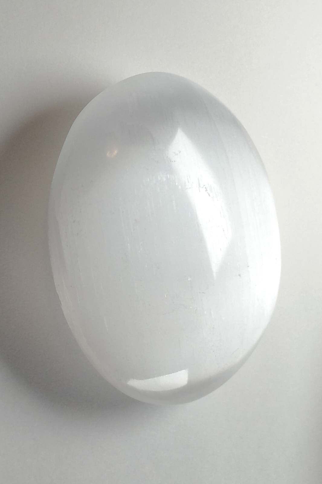 Polished Selenite with a Clouded White Center 69mm 98g